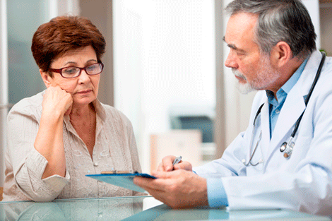 woman listening to her doctor